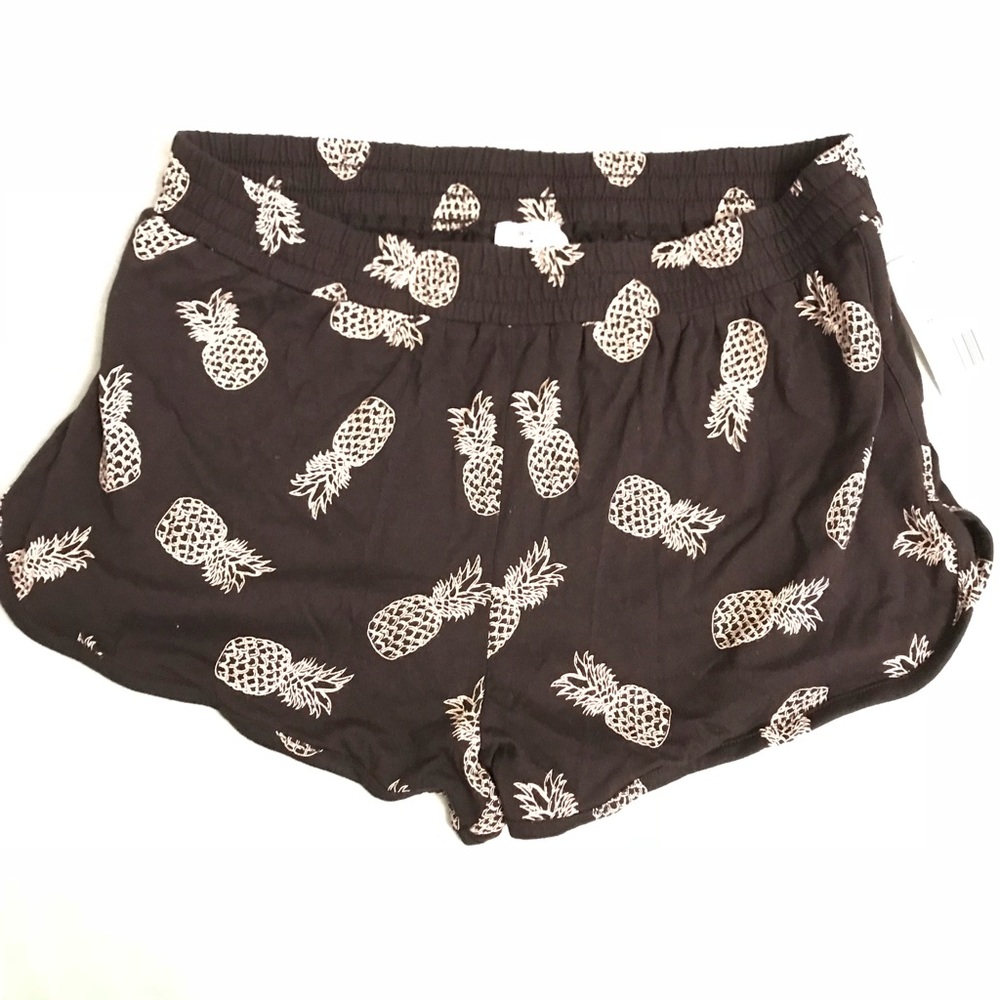 SOLD Pineapple print black stretchy shorts size M